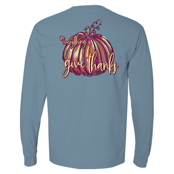 This cute Thanksgiving t-shirt for women has a colorful orange and pink painterly pumpkin with the words "In everything give thanks."