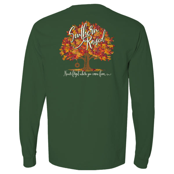 Southern t-shirt depicts colorful autumn tree with words "Southern Raised" in the tree and "Never forget where you came from" under the tree.    